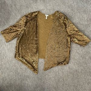 Anthropologie matte gold sequin jacket size medium.